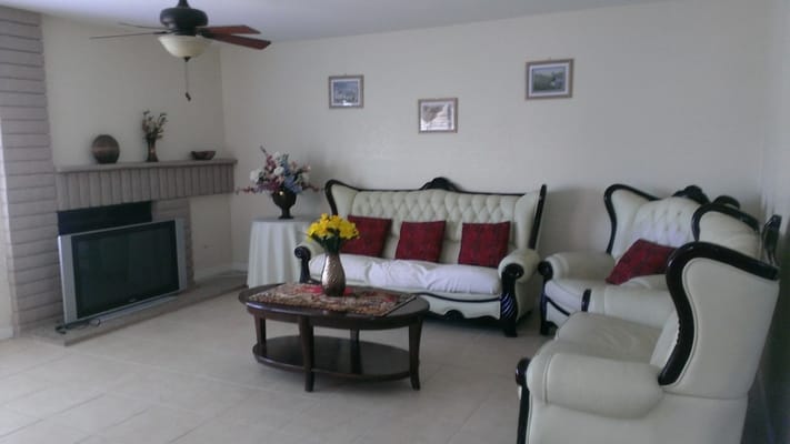 Well-furnished living room with comfortable sofas and a coffee table