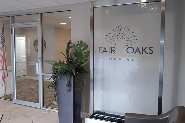 Logo of Fair Oaks Senior Living at the entrance