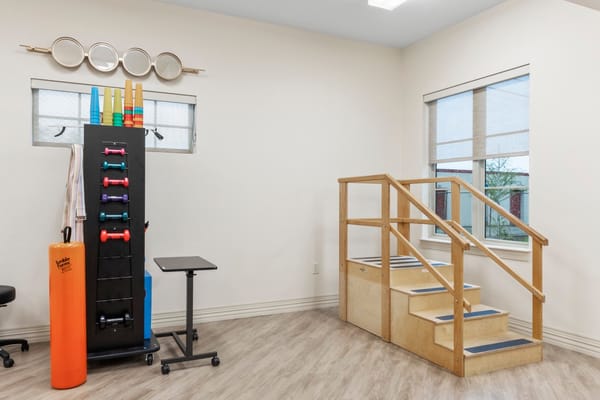 Exercise area with equipment and stairs