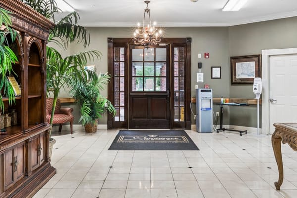 Interior view of the lobby with decorative furniture and plants