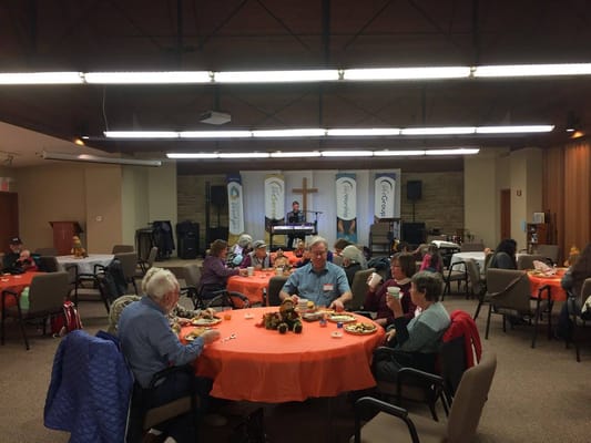 Residents enjoying a community meal at Sonrisas Assisted Living.