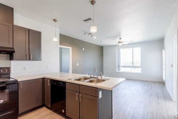 Bright and modern kitchen area in a senior living apartment