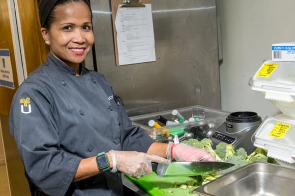 Chef preparing fresh vegetables in the kitchen