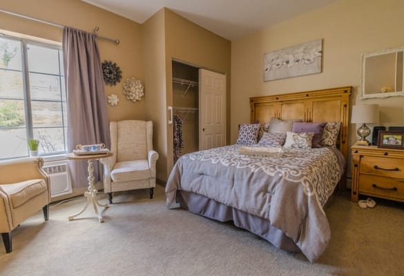 A comfortable private bedroom in an assisted living facility