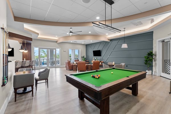 An inviting interior lounge area with a pool table