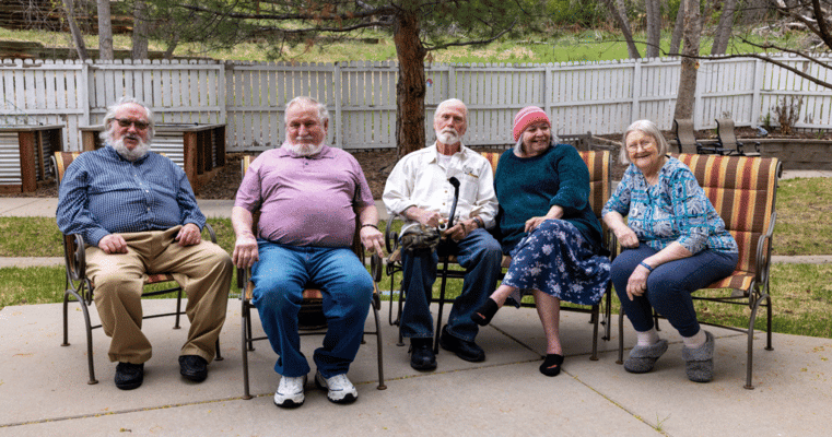 Residents enjoying an afternoon in a garden area