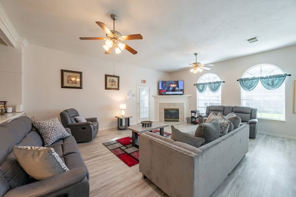 Cozy living area with comfortable seating and a fireplace