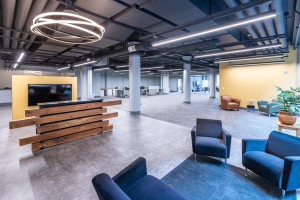 Modern lobby with seating and reception desk