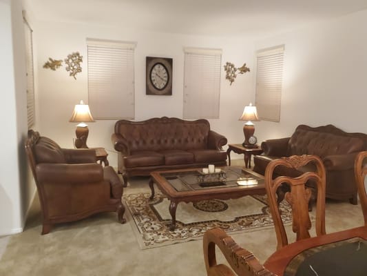 Cozy living room area with leather furniture