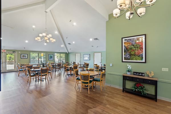 Bright dining room with tables and chairs