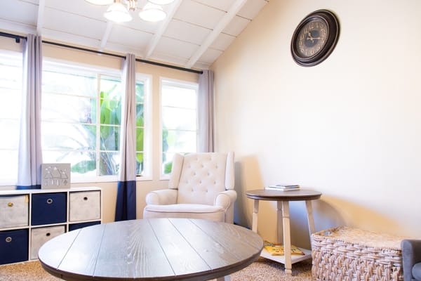 Cozy common area with seating and natural light