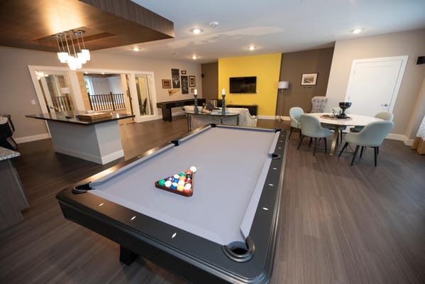 Interior common area with pool table and seating