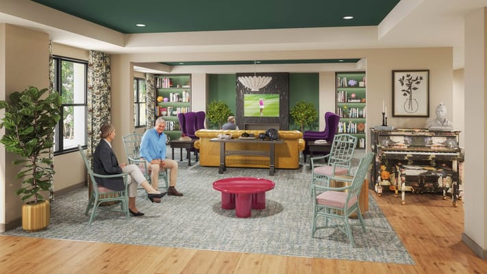 Cozy lounge area with residents in conversation