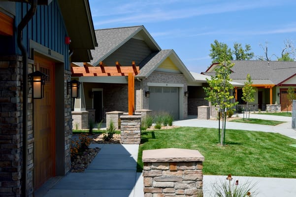 Exterior view of assisted living patio homes with landscaping