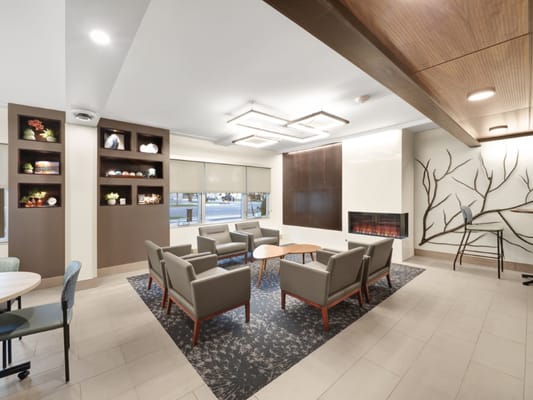 Interior common area with seating and fireplace