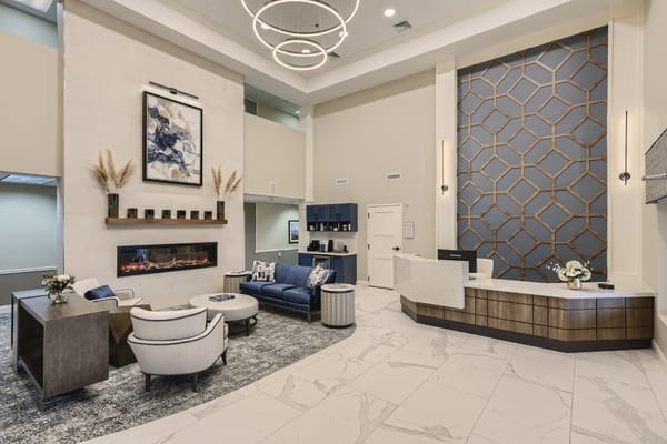 Modern lobby area with seating and reception desk