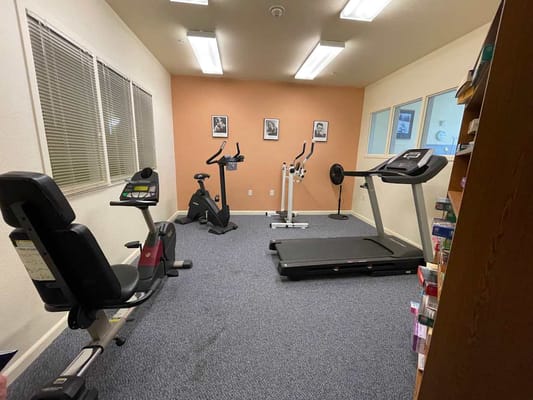 Interior view of a fitness room with exercise equipment