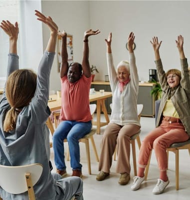 Residents participating in a group exercise class