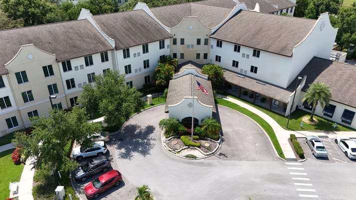 Aerial view of Arbor Terrace Citrus Park showing the entrance and landscaping