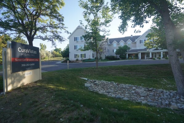 Exterior view of CuraVistas Highline with sign