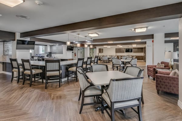 Interior view of the common area with seating and tables