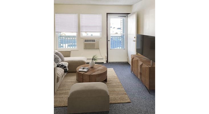 Cozy living room with a sofa and TV