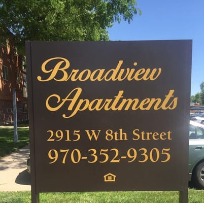 Sign for Broadview Apartments with contact details