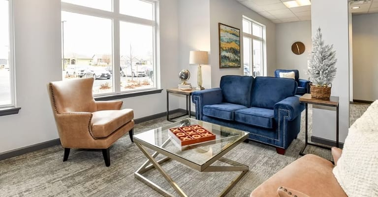 A cozy common area with seating and decor