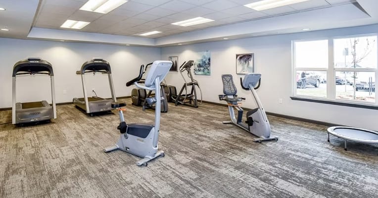 Well-equipped fitness center with exercise machines