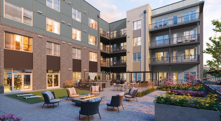 Outdoor seating area with fire pit at Aspendale Centennial