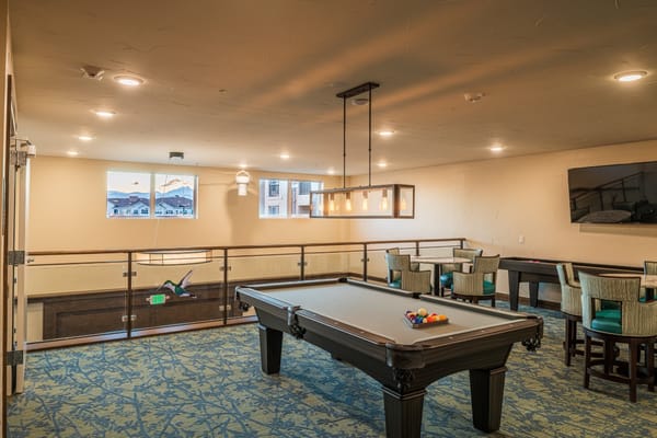 Interior common area with pool table and seating