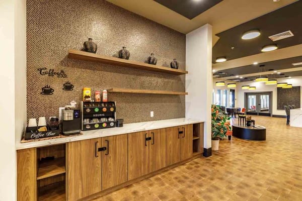 Coffee bar with a Keurig machine and decorative shelves