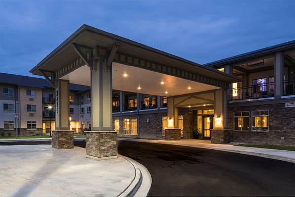Entrance of Affinity at Loveland with awning and warm lighting