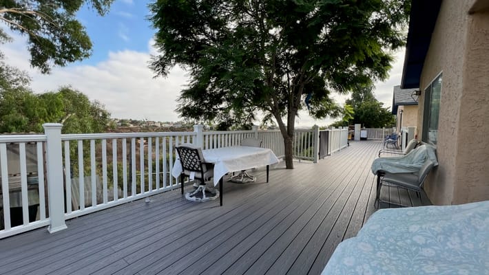 Outdoor deck area with tables and chairs