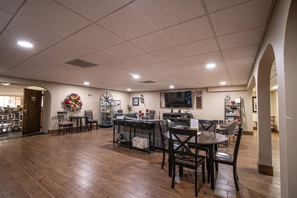 Common area with seating and displays in the facility.