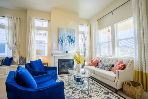 Bright common area with sofas and artwork