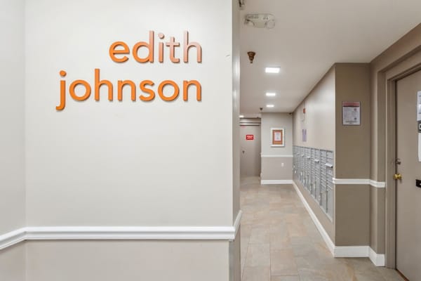 Interior hallway with signage for Edith Johnson
