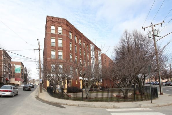 Exterior view of Enterprise Apartments and Abbott Towers