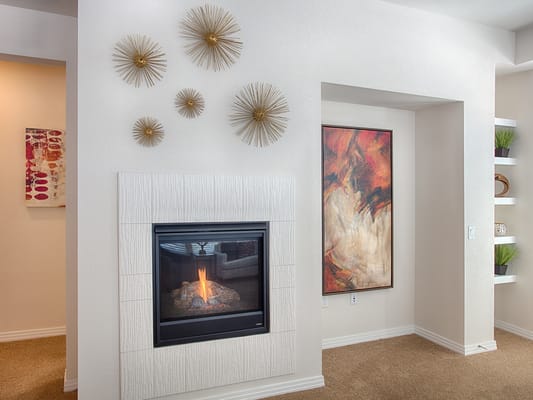 Cozy interior with a fireplace and wall decor