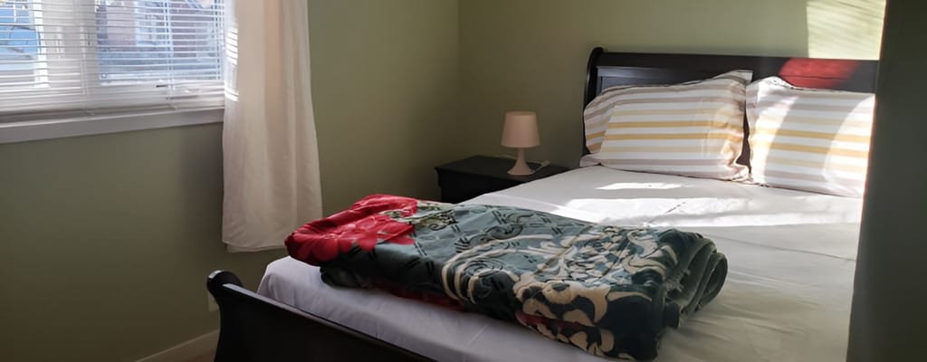 Cozy resident room with a neatly made bed