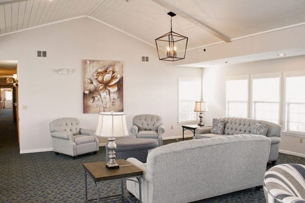 Cozy common area with seating and natural light