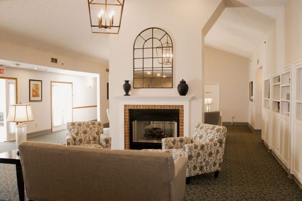 Cozy common area with seating and fireplace