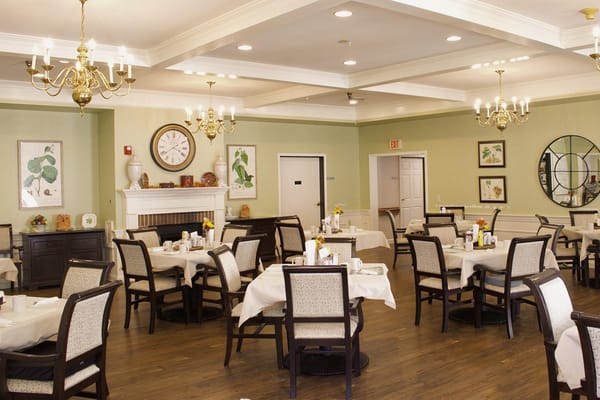 Bright dining room with round tables and decorative accents