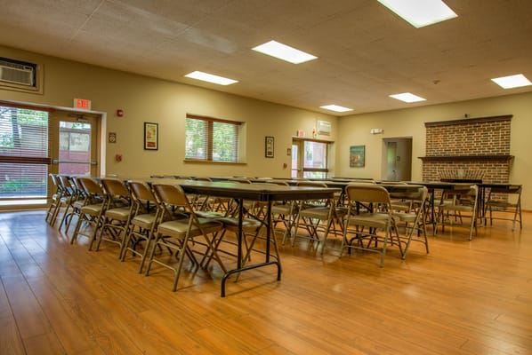 Interior view of a common area with chairs and tables