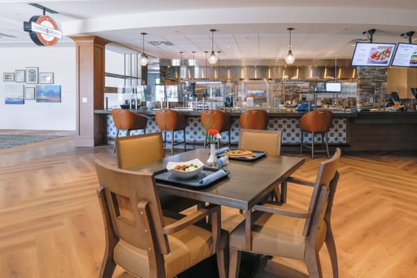 Dining area with food served on the table