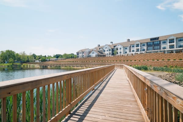 Wooden walkway leading to the facility by the water