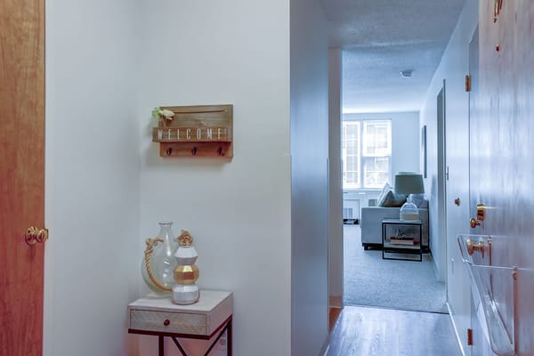 Interior hallway with a welcome sign