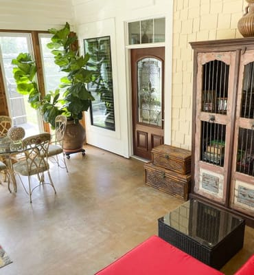 Bright, inviting common area with seating and plants