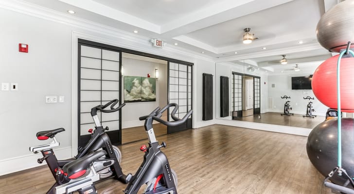 Fitness room with stationary bikes and mirrors