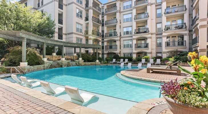 Beautiful outdoor pool area with comfortable seating